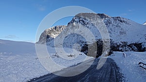 Mountain peak at Visitor centre on Trollstigen road in snow in Norway in autumn