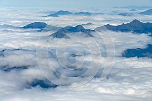 Mountain peaks above the clouds. View from the Pic du Midi de Bigorre in the Pyrenees France