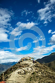 Mountain peaks and Buddhist prayer flags in Tibet, China