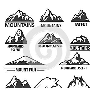 Mountain peaks emblems - alpinism and ascent photo