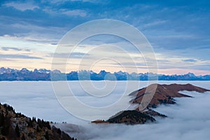 Mountain peaks emerging from the clouds