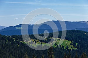 Mountain peaks with greenery and snow in Carpathians