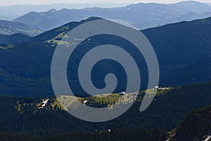 Mountain peaks with greenery and snow in Carpathians