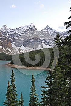 Mountain peaks and moraine lake