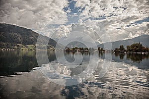 Mountain peaks, puffy clouds and Zeller lake views from Zell am See, Austria