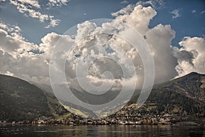 Mountain peaks, puffy clouds and Zeller lake views from Zell am See, Austria