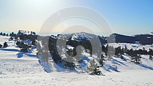 Mountain plateau in the snow on a sunny day