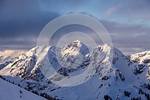 Mountain portrait Birnhorn Saalbach dramatic clouds perfect blue sky light scenic mood