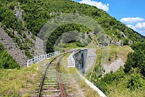Mountain railway, viaduct and tunnel photo