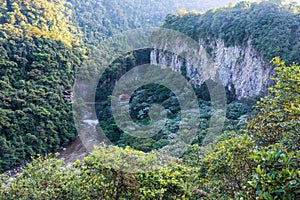 Mountain rainforest in canyon near Pailon del Diablo, Banos. Ecuador photo