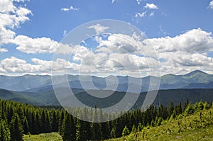 Mountain range Chornohora with its spurs in the Carpathian Mountains. View from the opposite Kostrych ridge