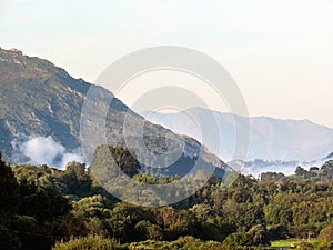 Mountain range and clouds in Asturias Camino del Norte, the Northern Way of Saint James in Spain photo