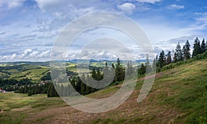 Mountain range clouds panoramic landscape.