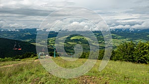 Mountain range clouds panoramic landscape.