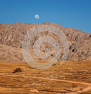 Mountain range and full moon