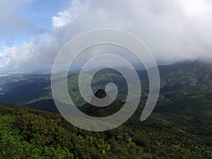 Mountain range landscape to the sea in El Yunque Rainforest photo