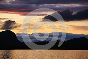 Mountain range Marsfjaellen seen in sunset from lake Kultsjon in Vasterbotten, Sweden