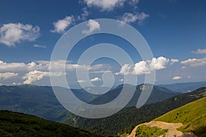 Mountain range meadows sky view from the top