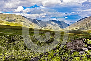 Mountain range in the subpolar urals on a summer day photo