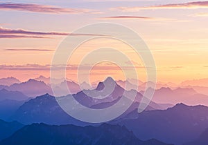 Mountain range at sunset with a panoramic view of multiple