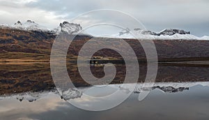 Mountain reflections in Berufjordur, eastern fjords photo