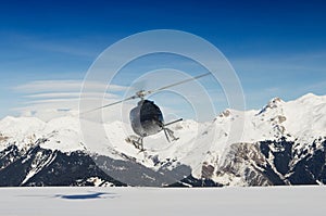 Mountain rescue helicopter in flight