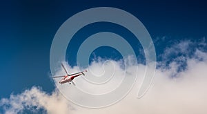 Mountain Rescue helicopter TOPR - Tatrzanskie Ochotnicze Pogotowie Ratownicze during emergency callout in Tatra Mountains in