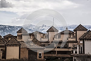 Mountain residential areas and snowy landscape in southern Spain