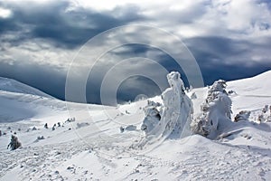 Mountain resort landscape under cloudy sky