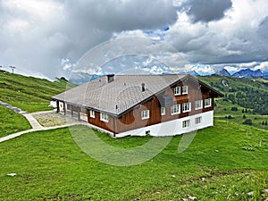 Mountain restaurant Sternen on the mountain range First and in the Schwyz Alps mountain massif, Oberiberg - Canton of Schwyz photo