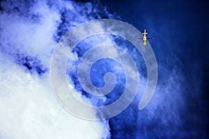 Mountain resue helicopter hanging in the blue sky