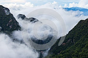 mountain ridge and clouds in rural jungle bush forest. Ban Phahee, Chiang Rai Province, Thailand