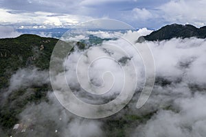 mountain ridge and clouds in rural jungle bush forest. Ban Phahee, Chiang Rai Province, Thailand