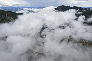 mountain ridge and clouds in rural jungle bush forest. Ban Phahee, Chiang Rai Province, Thailand