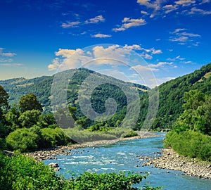 Mountain river on a clear summer day