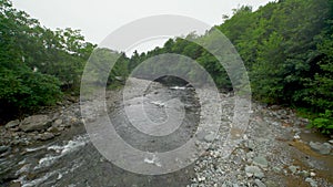 Mountain river flowing in a tropical forest.