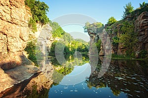 Mountain river Gornij Tikich with cliffs and trees