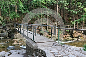 Mountain river Mumlava, Krkonose national park, Czech Republic, summer afternoon, footbridge above river, Mumlava waterfall