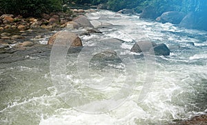 Mountain river rocks background.