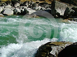 Mountain river with the thresholds