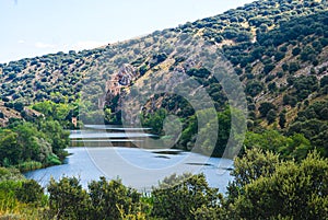Mountain river view. Old castle in the mountains