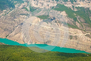 Mountain river water landscape. Wild turquoise river in a mountain gorge.