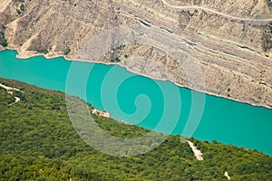 Mountain river water landscape. Wild turquoise river in a mountain gorge.