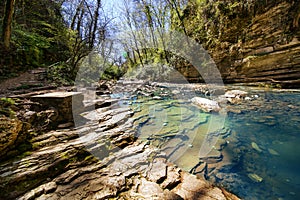 The mountain river with waterfall