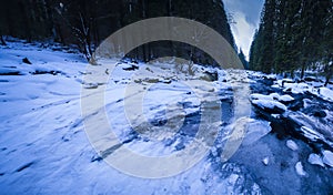 mountain river in the winter time