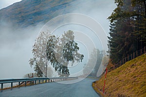 Mountain road above the clouds