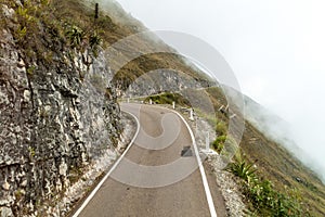 Mountain road in clouds photo