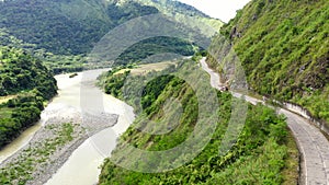 Mountain road on the island of Luzon, aerial view. Empty Road in Cordillera Mountains, Luzon, Philippines