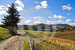 Mountain road and landscape at autumn sunny day, Radocelo mountain