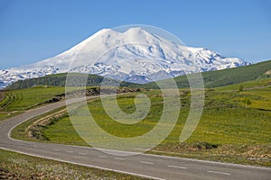 Mountain road overlooking Elbrus, Kabardino-Balkaria photo